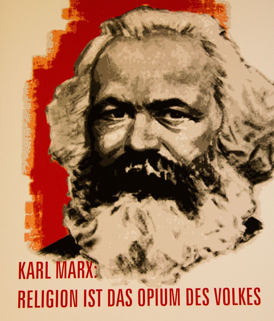 agama adalah candu karl marx maksud dari pernyataannya